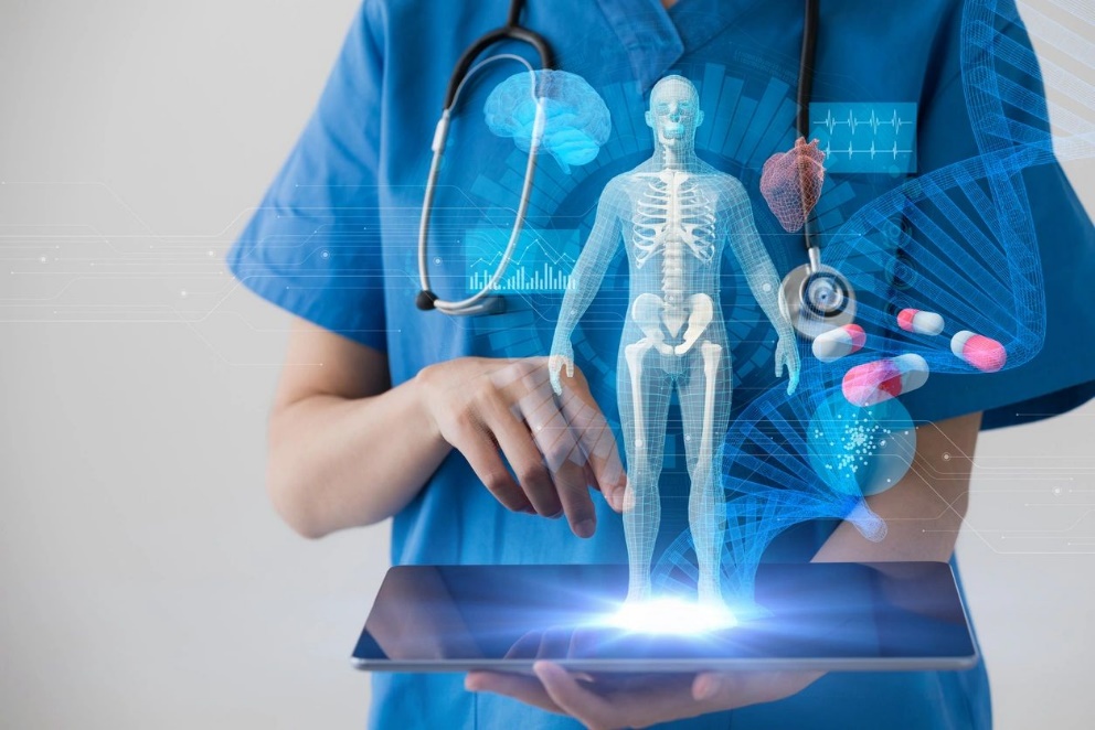 hero A doctor is holding an interactive tablet with a skeleton.